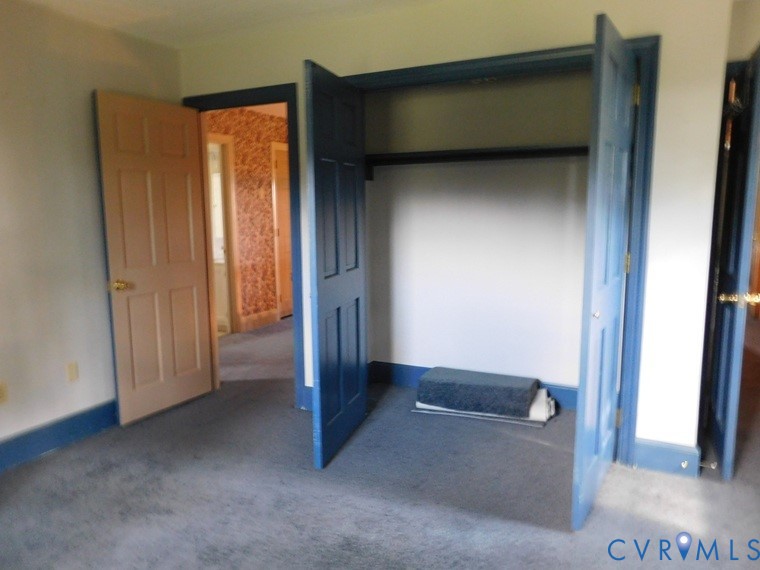838 Crymes Road Keysville, VA 23947 - Photo 15 of 49 Unfurnished bedroom featuring carpet flooring and