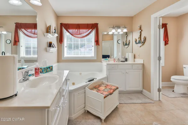 a bathroom with a sink toilet and a bathtub
