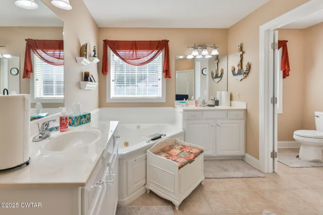 a bathroom with a sink toilet and a bathtub