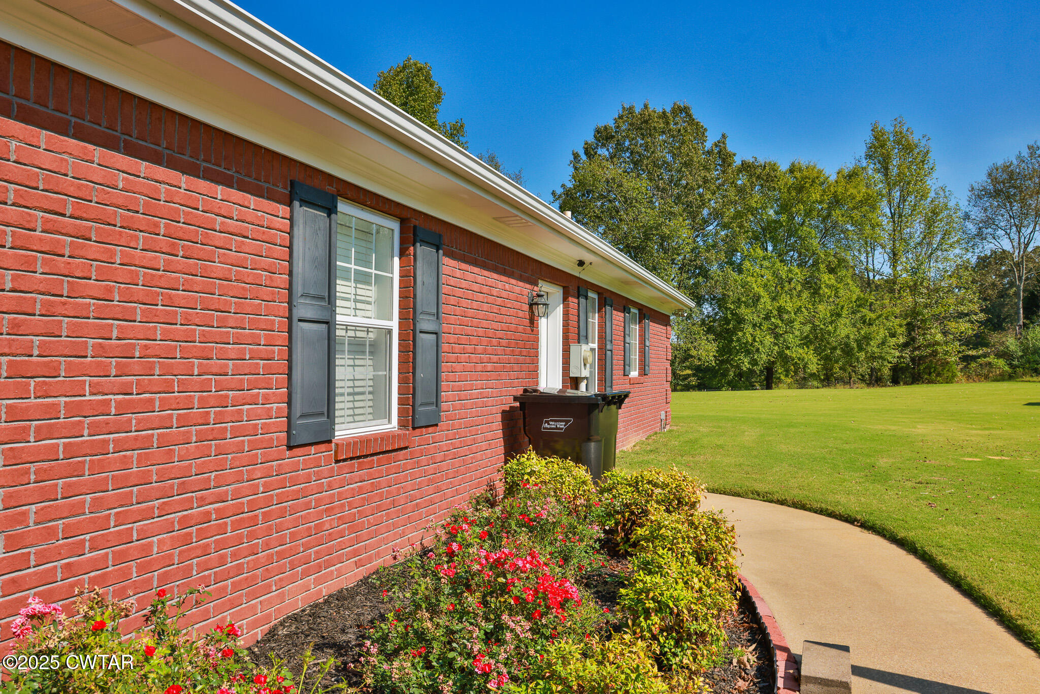 148 Scattered Acres Loop Dyer, TN 38330 - Photo 23 of 31 a front view of a house with a yard
