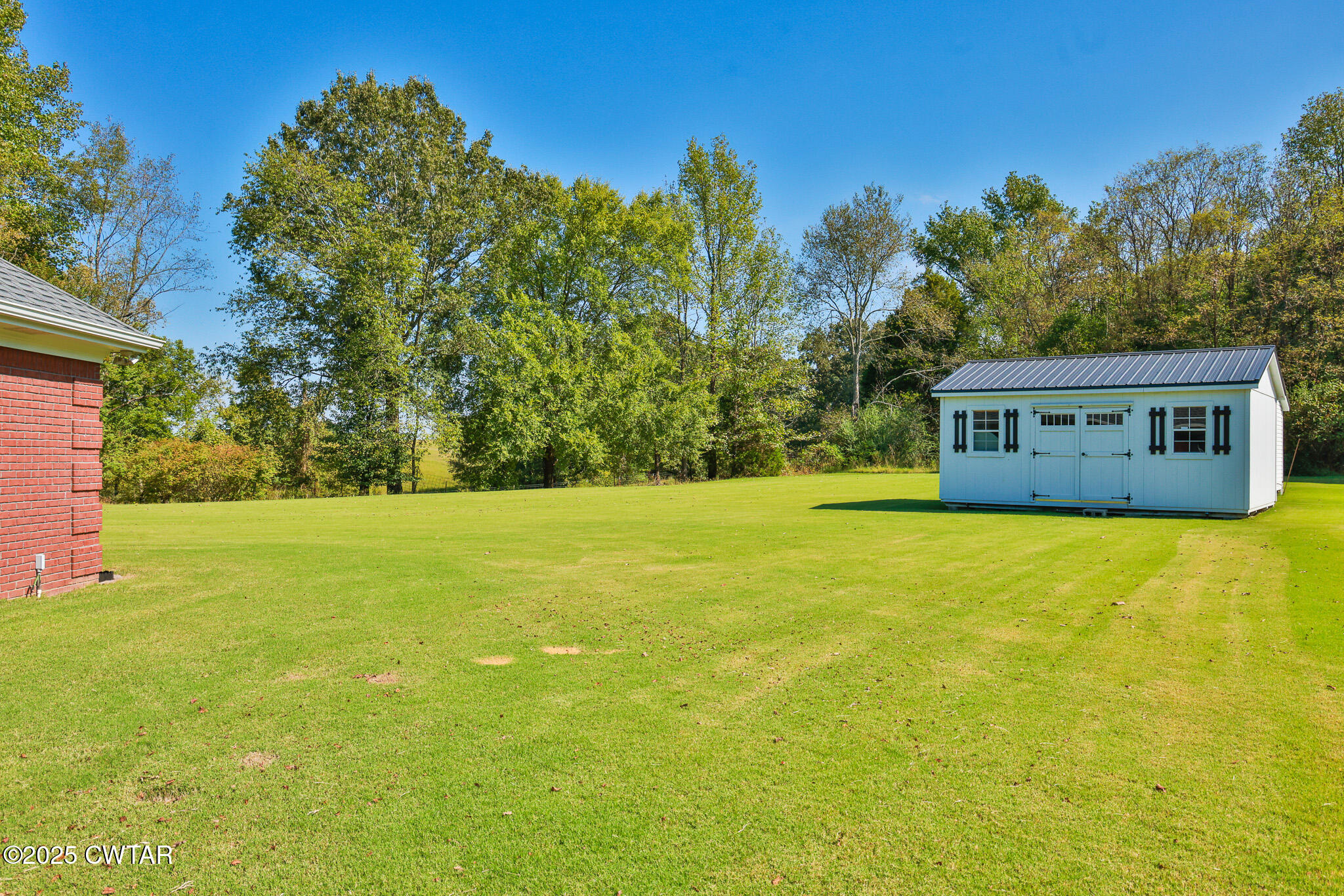 148 Scattered Acres Loop Dyer, TN 38330 - Photo 24 of 31 a view of house with outdoor space
