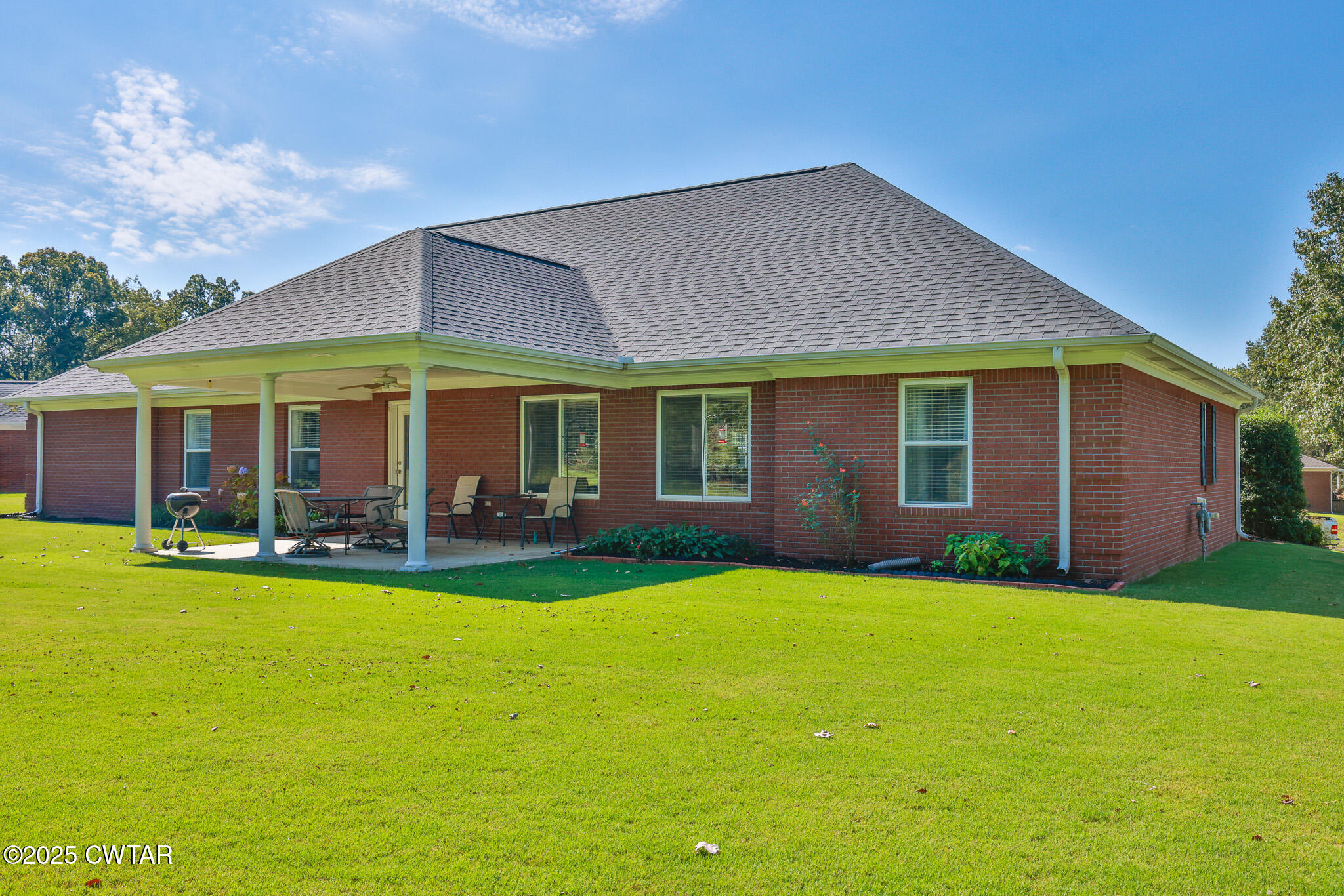 148 Scattered Acres Loop Dyer, TN 38330 - Photo 28 of 31 a view of a house with a yard and swimming pool