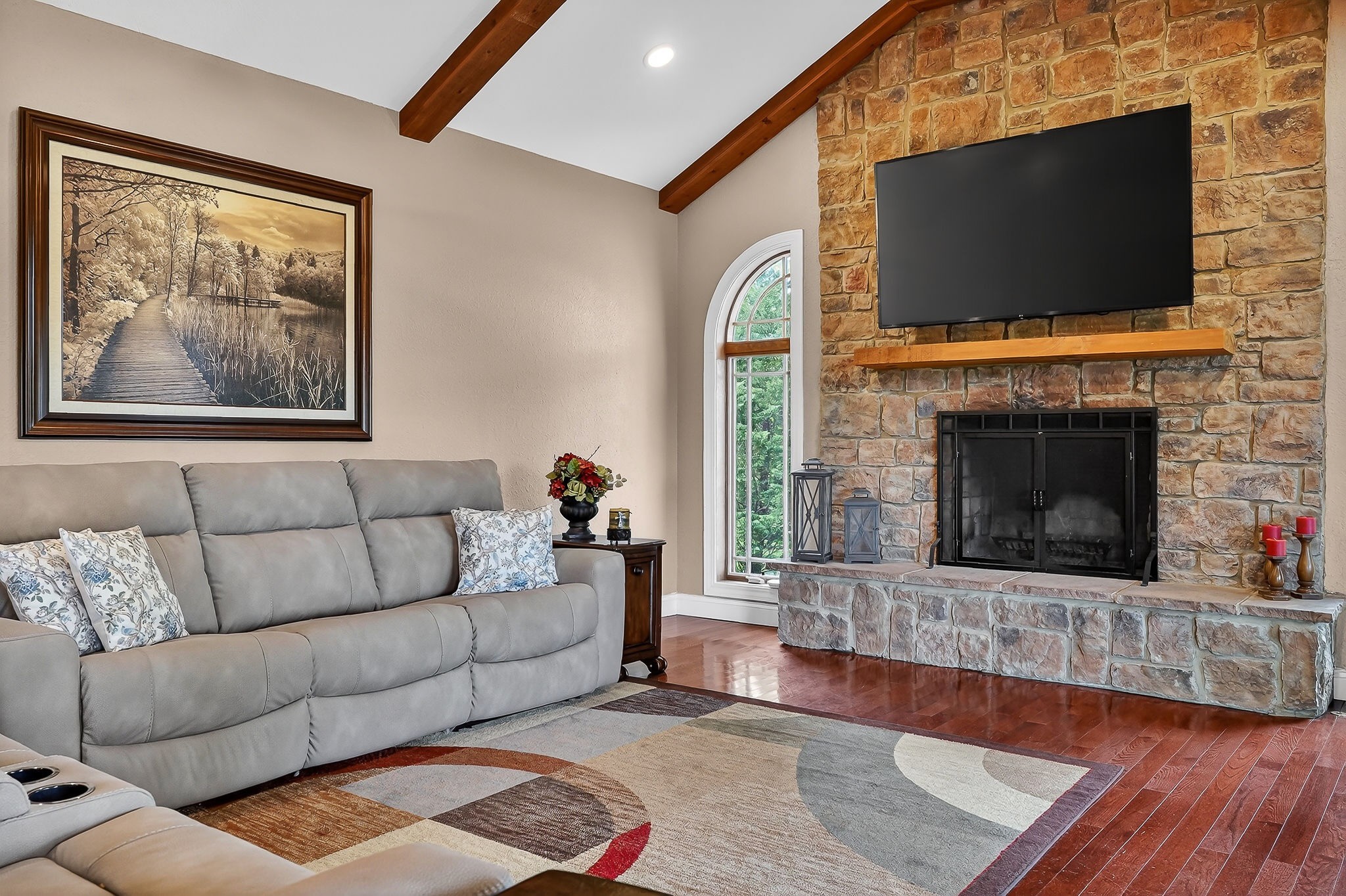 933 John Henry Lewis Road Dunlap, TN 37327 - Photo 56 of 100 a living room with furniture a flat screen tv and a fireplace