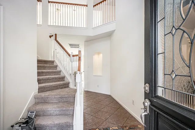 a view of an entryway with staircase