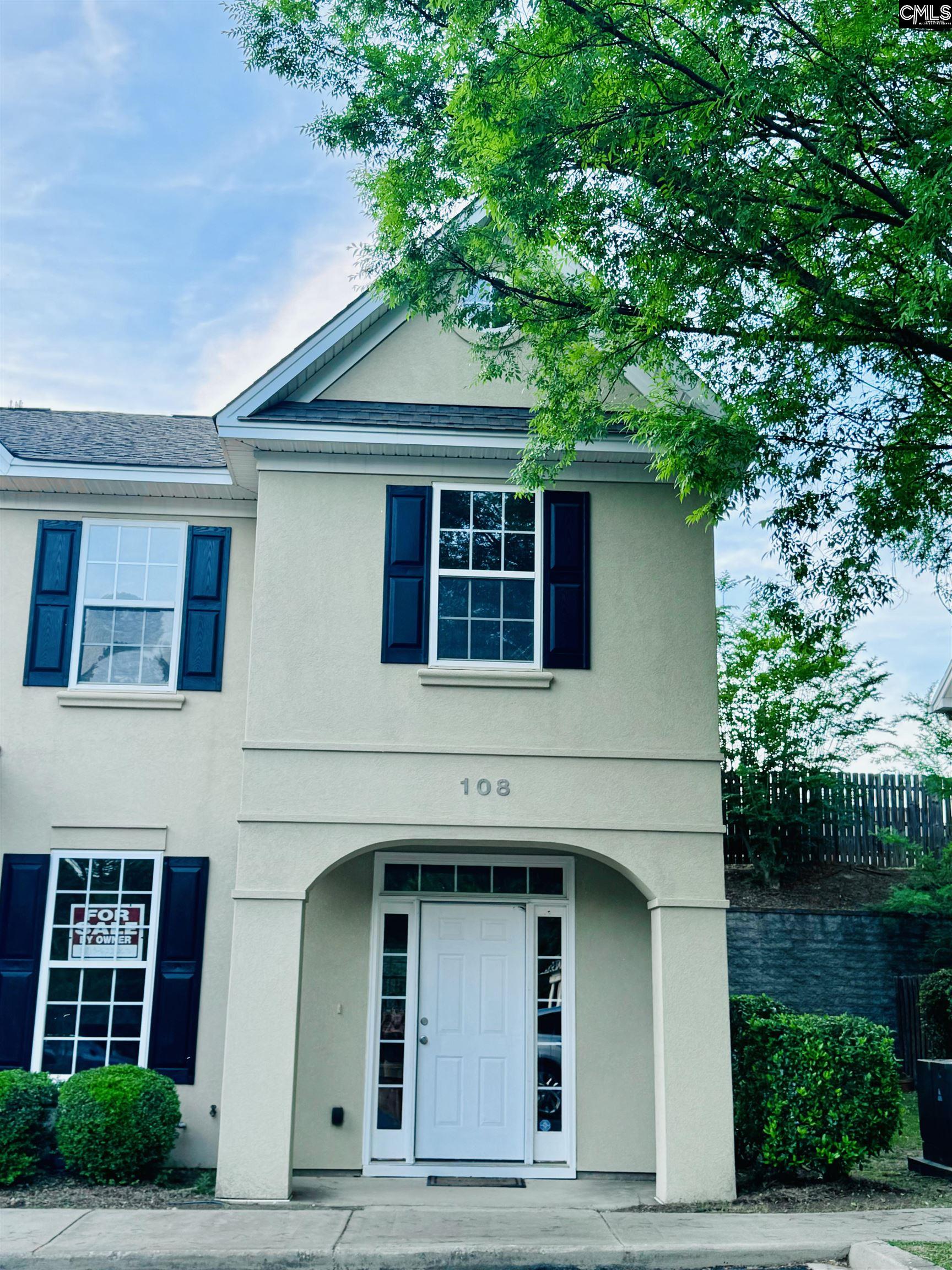 108 Tuscany Court Irmo, SC 29063 - Photo 2 of 13 a front view of a house with garden