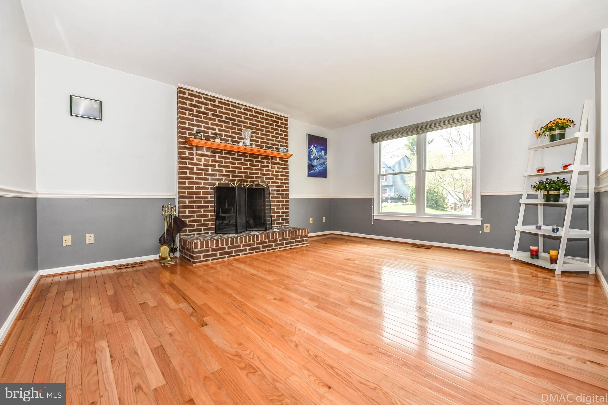 10794 Forest Edge Circle New Market, MD 21774 - Photo 7 of 41 Family room with wood floors