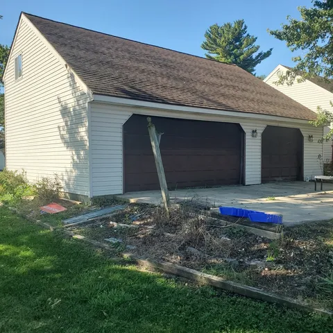 a front view of house with yard