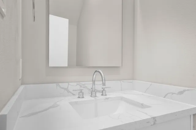 a view of an house with backyard space and garden