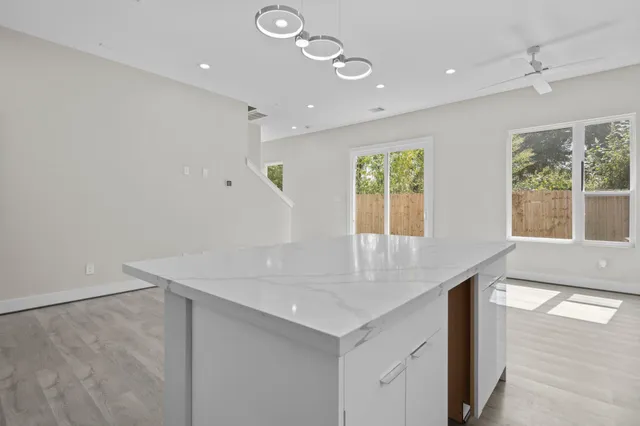 a view of a hallway with washer and dryer