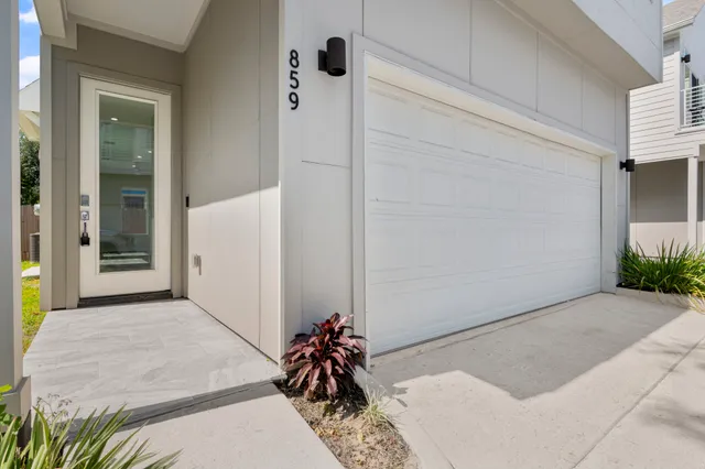 a view of staircase with white walls