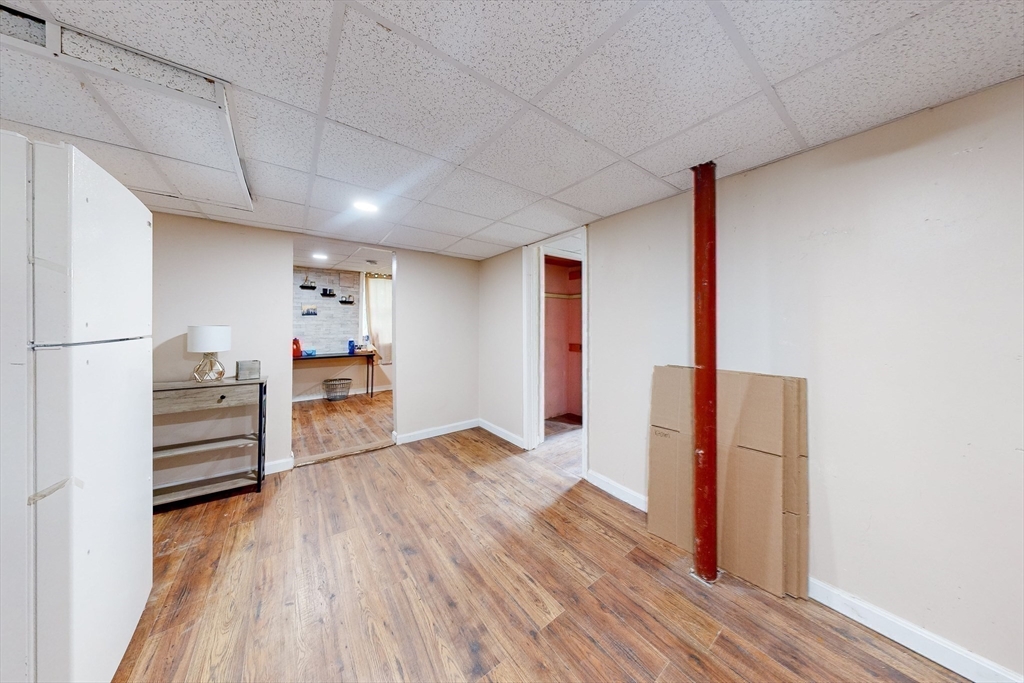 249 North Main Street Webster, MA 01570 - Photo 28 of 32 a view of a hallway with wooden floor