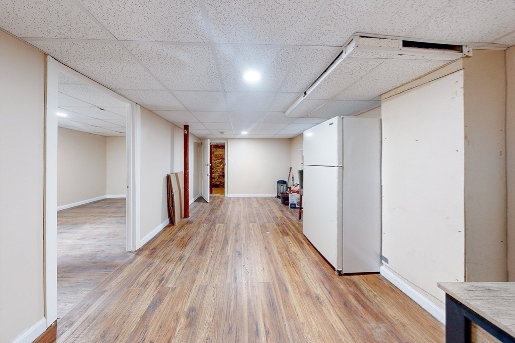 249 North Main Street Webster, MA 01570 - Photo 29 of 32 a view of a hallway with wooden floor