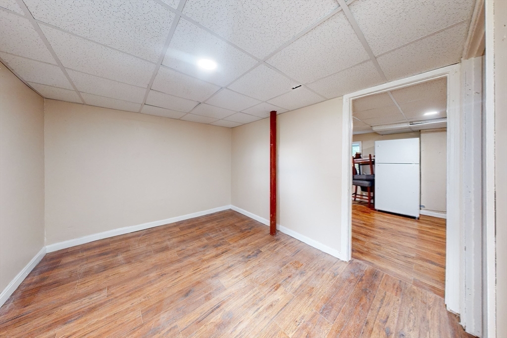 249 North Main Street Webster, MA 01570 - Photo 31 of 32 a view of an empty room with wooden floor