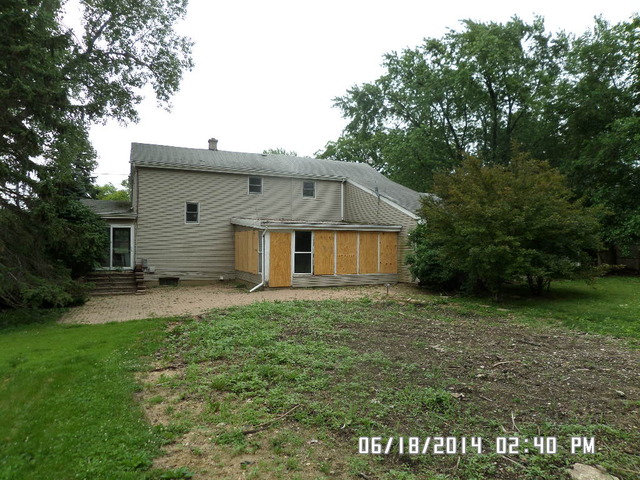 11480 Bell Road Lemont, IL 60439 - Photo 14 of 14 a view of a house with a yard