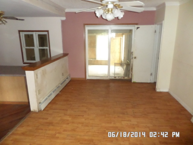 11480 Bell Road Lemont, IL 60439 - Photo 3 of 14 a view of an empty room with a window