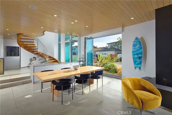 a view of a living room and kitchen view