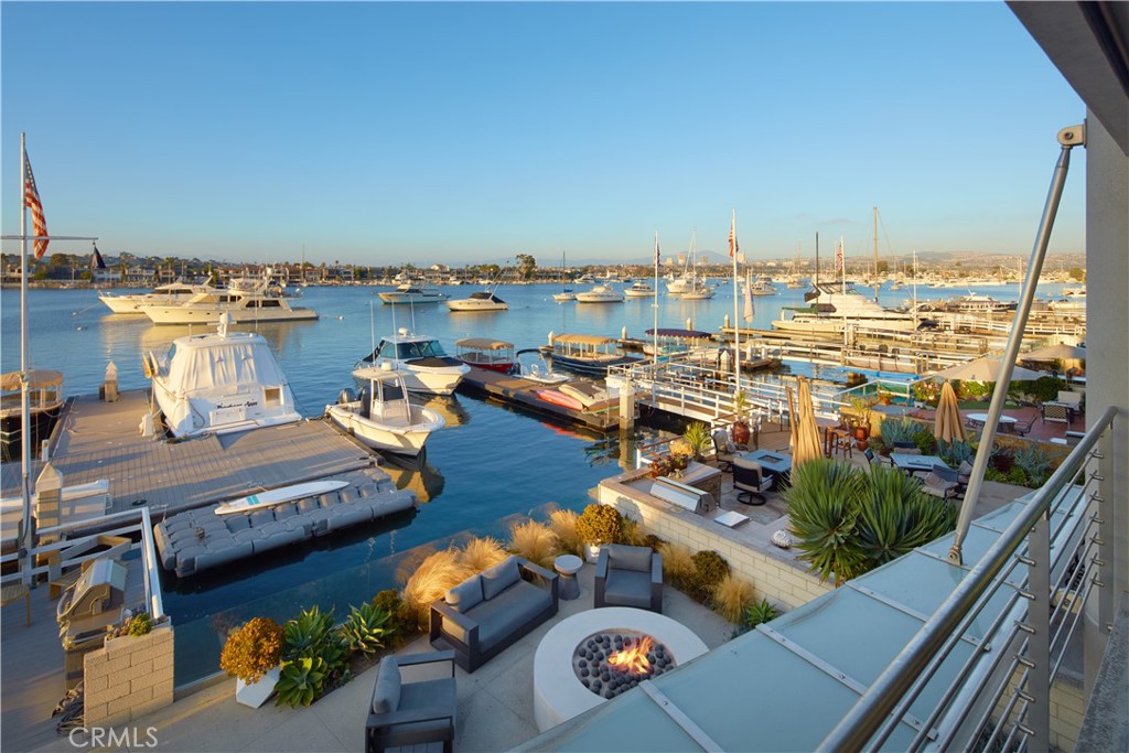 1042 West Bay Avenue Newport Beach, CA 92661 - Photo 24 of 37 a view of a balcony with chairs