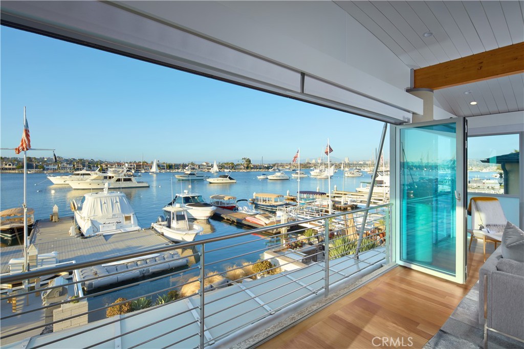 1042 West Bay Avenue Newport Beach, CA 92661 - Photo 25 of 37 a view of a balcony with wooden floor