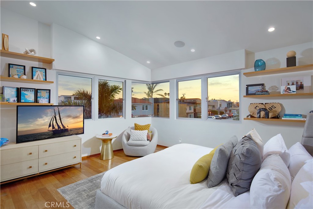 1042 West Bay Avenue Newport Beach, CA 92661 - Photo 31 of 37 a living room with furniture and a large window