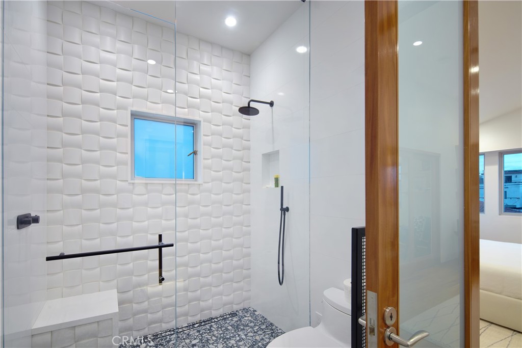 1042 West Bay Avenue Newport Beach, CA 92661 - Photo 33 of 37 a bathroom with a shower