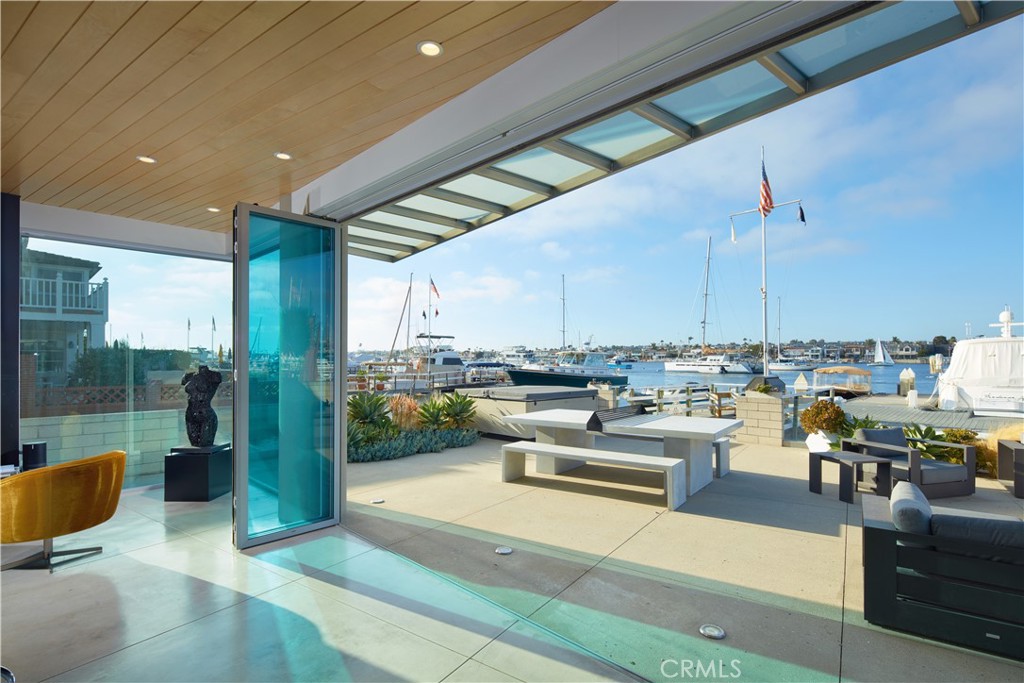 1042 West Bay Avenue Newport Beach, CA 92661 - Photo 7 of 37 a view of a terrace with seating area