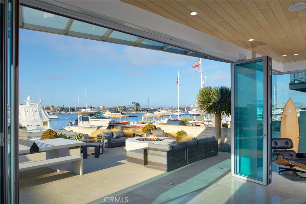 1042 West Bay Avenue Newport Beach, CA 92661 - Photo 8 of 37 a view of a balcony and chairs