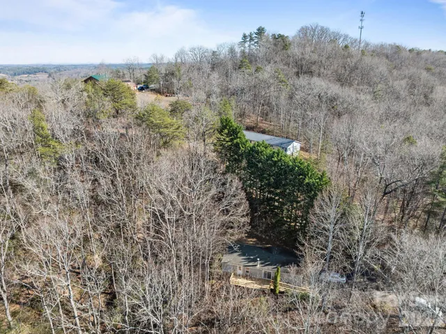 a view of a yard with a bench and bench