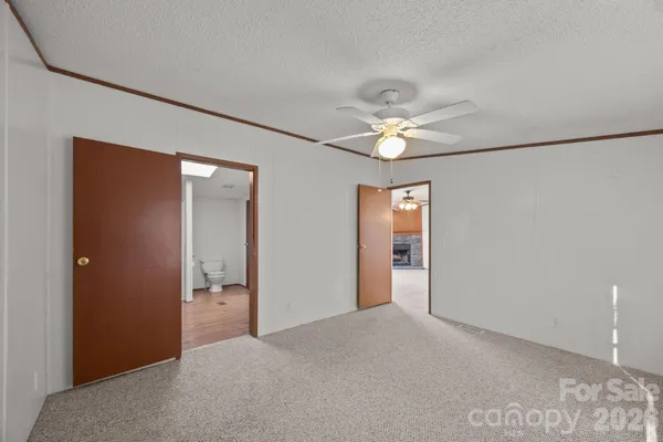a area with wooden floor and closet