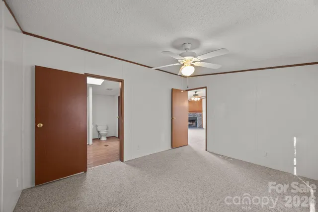 a area with wooden floor and closet