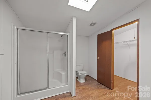 a view of hallway with a small space