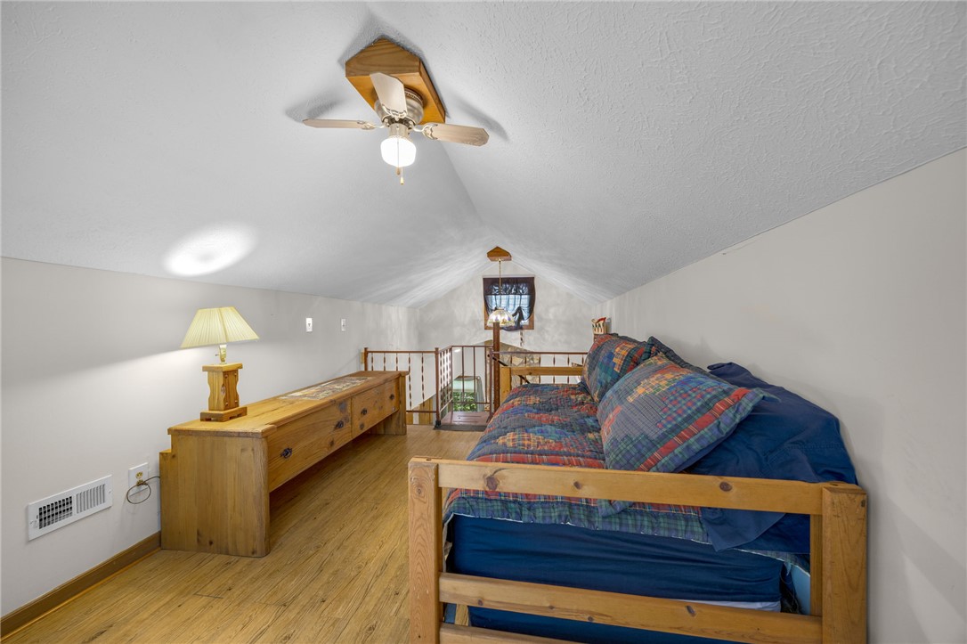 437 West Gate Road Pickens, SC 29671 - Photo 13 of 47 This cozy loft features sloped ceilings and durable wood flooring.