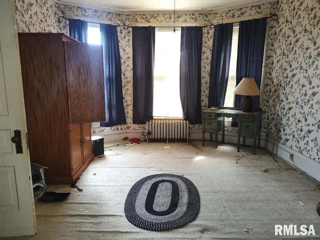 a view of a livingroom with a window