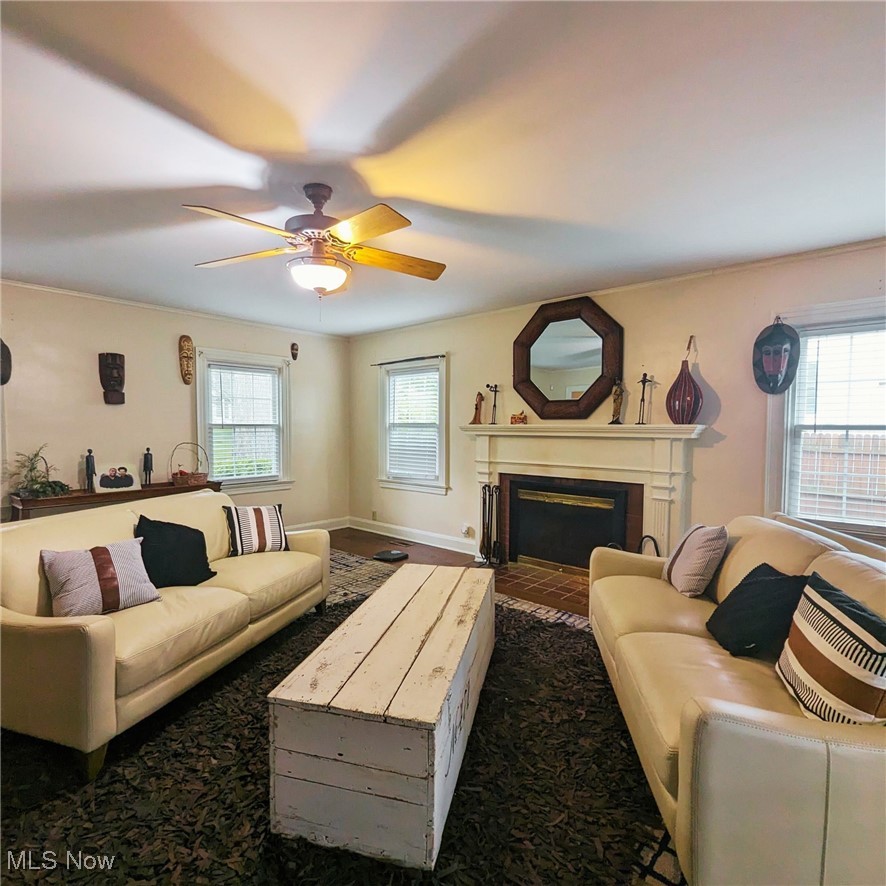 557 Cambridge Road Coshocton, OH 43812 - Photo 5 of 20 Spacious living area with a fireplace perfect for relaxation.
