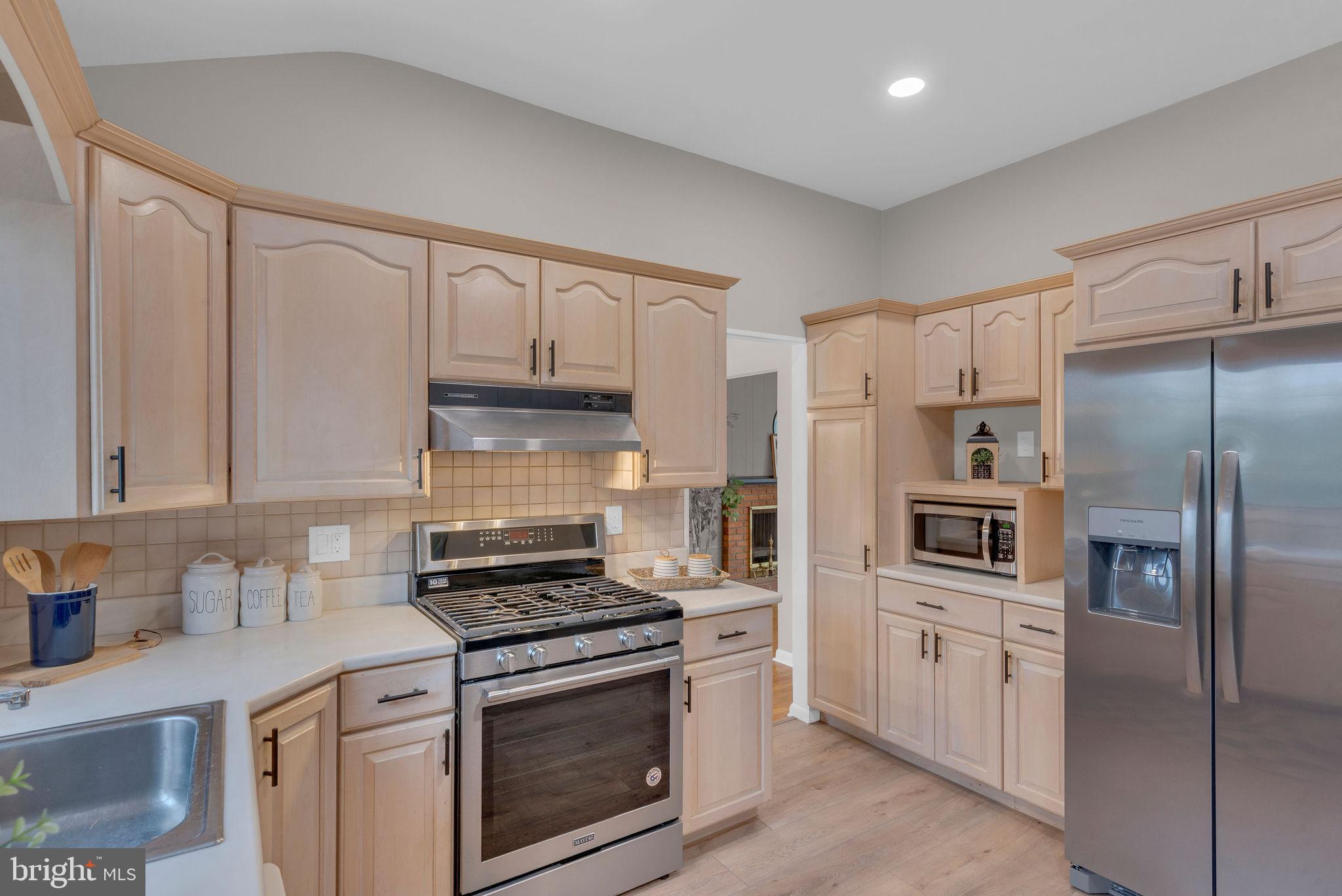 122 Leeds Road Mount Laurel, NJ 08054 - Photo 15 of 36 a kitchen with cabinets stainless steel appliances and a counter space