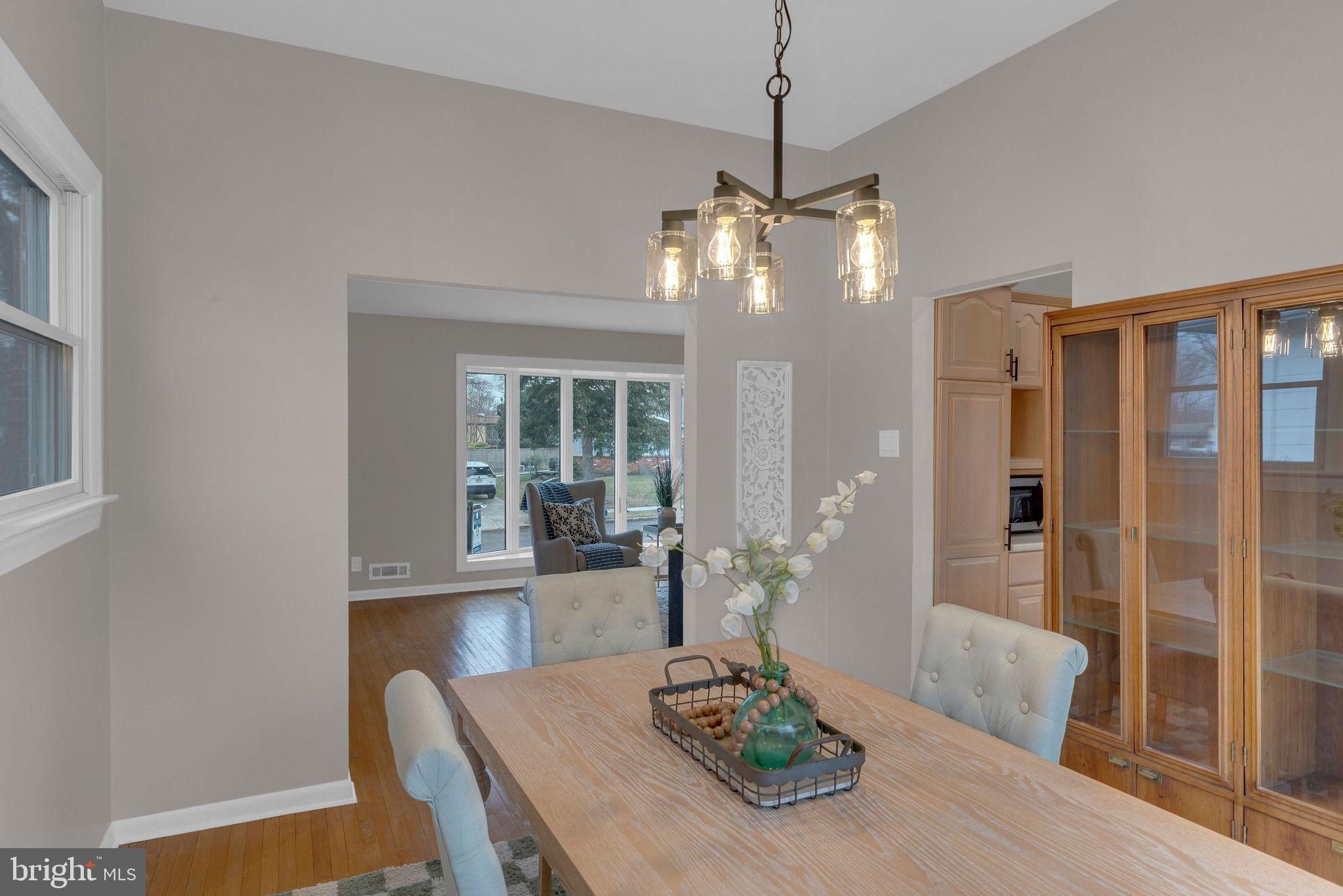 122 Leeds Road Mount Laurel, NJ 08054 - Photo 18 of 36 a view of a dining room with furniture wooden floor and chandelier