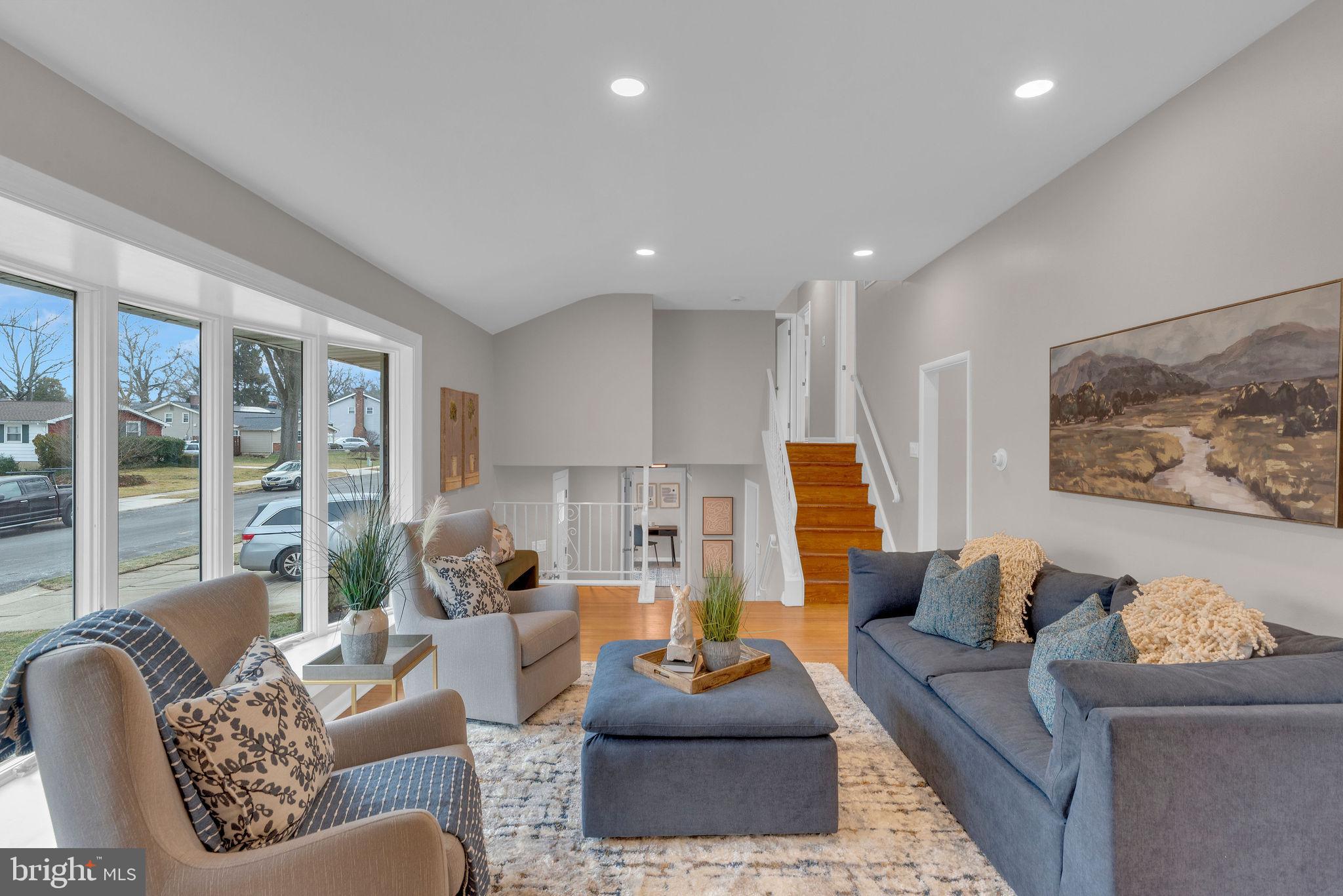 122 Leeds Road Mount Laurel, NJ 08054 - Photo 19 of 36 a living room with furniture and a large window