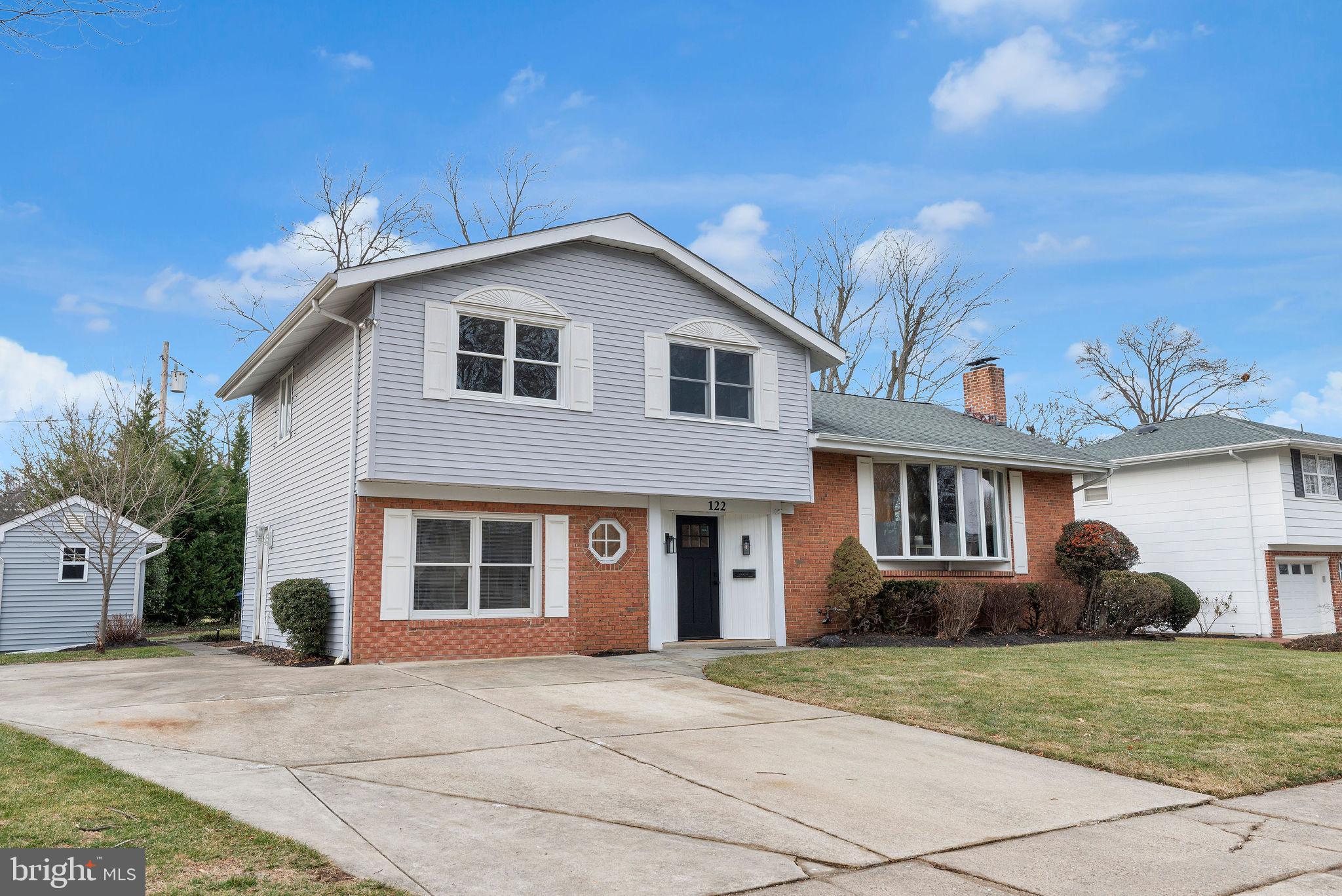 122 Leeds Road Mount Laurel, NJ 08054 - Photo 32 of 36 a front view of a house with a garden