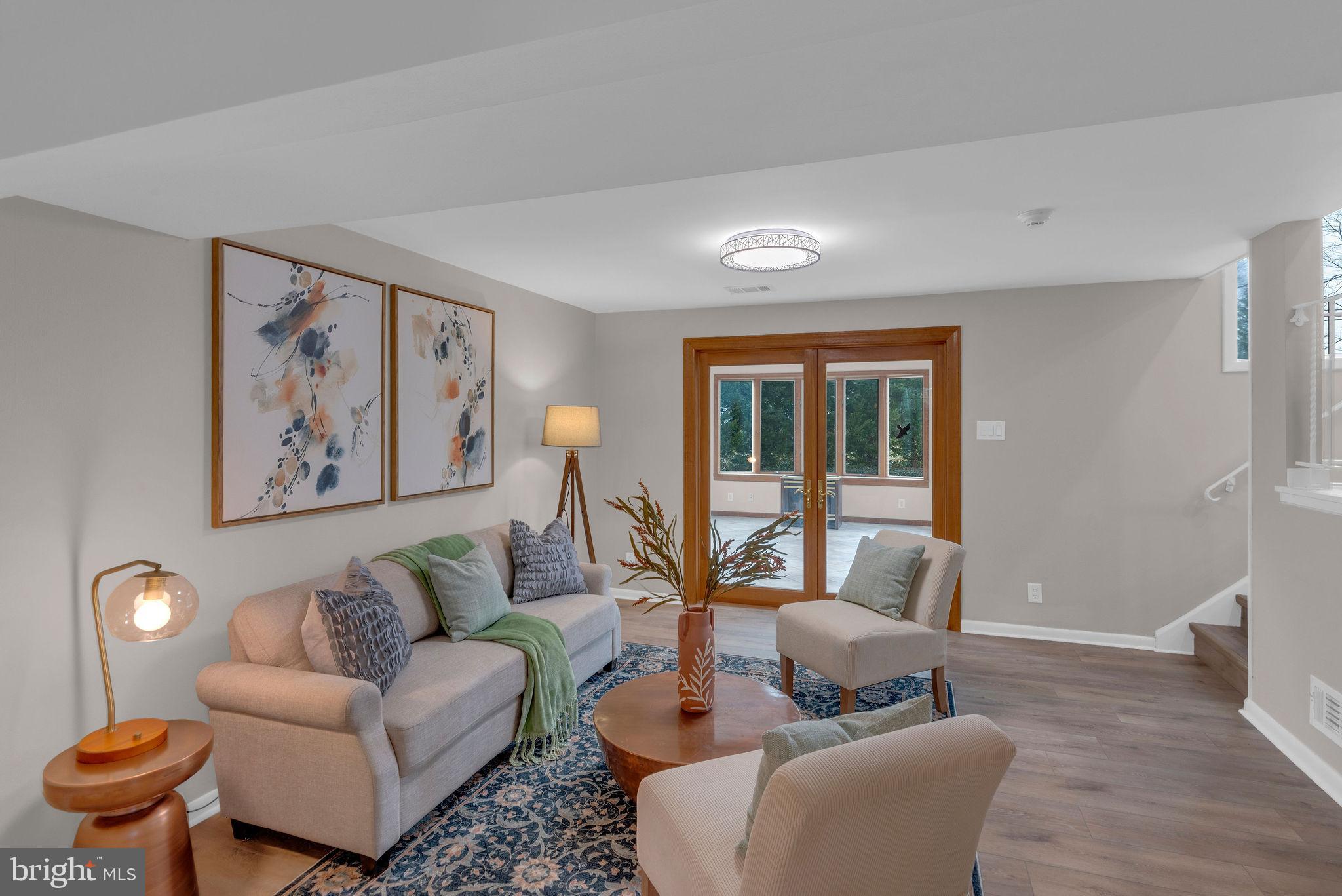122 Leeds Road Mount Laurel, NJ 08054 - Photo 8 of 36 a living room with furniture and a large window
