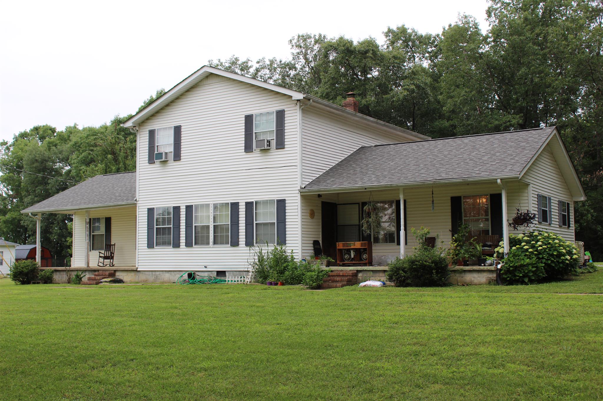 4749 Ollie Chunn Road Spring Hill, TN 37174 - Photo 1 of 11 a view of a house with backyard and garden