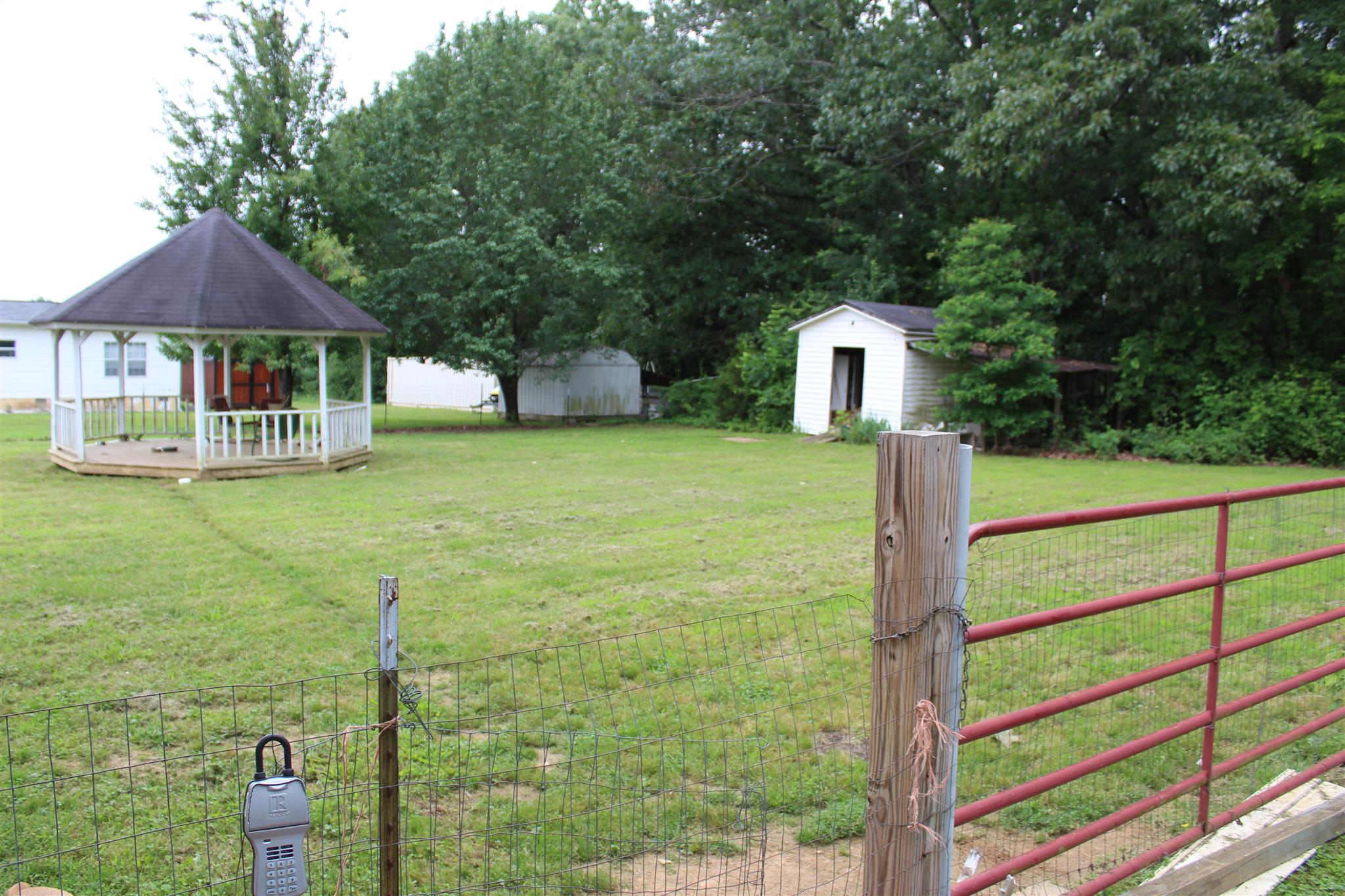 4749 Ollie Chunn Road Spring Hill, TN 37174 - Photo 7 of 11 a front view of a house with a yard