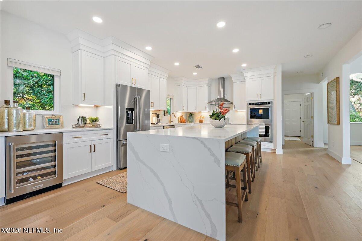 2253 Beachcomber Trail Atlantic Beach, FL 32233 - Photo 11 of 42 a kitchen with refrigerator and cabinets