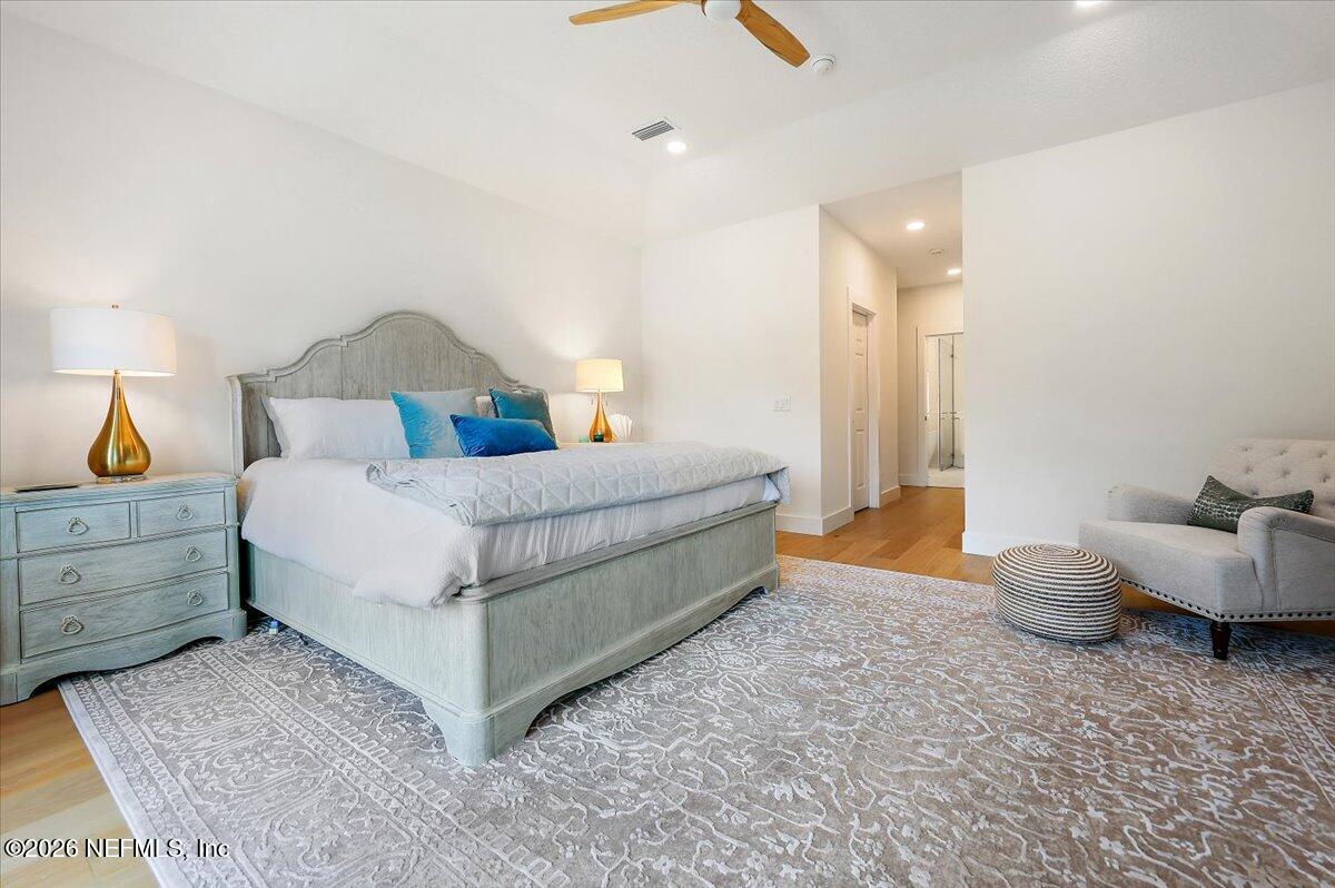 2253 Beachcomber Trail Atlantic Beach, FL 32233 - Photo 19 of 42 a spacious bedroom with a bed and a couch