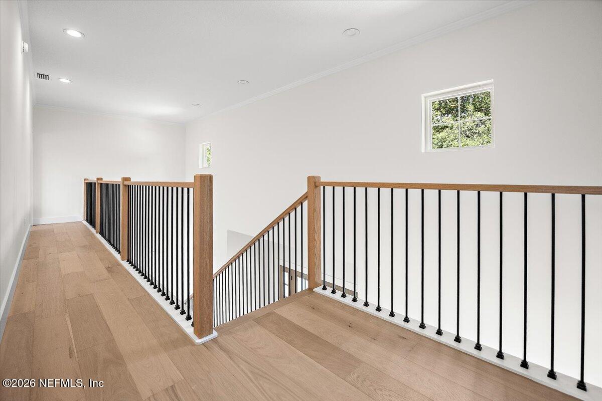 2253 Beachcomber Trail Atlantic Beach, FL 32233 - Photo 26 of 42 a view of a hallway with wooden floor