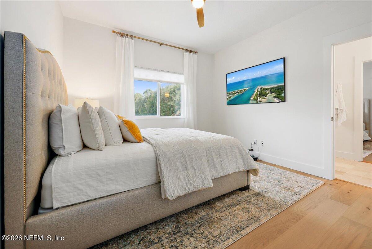 2253 Beachcomber Trail Atlantic Beach, FL 32233 - Photo 27 of 42 a bedroom with a bed and window