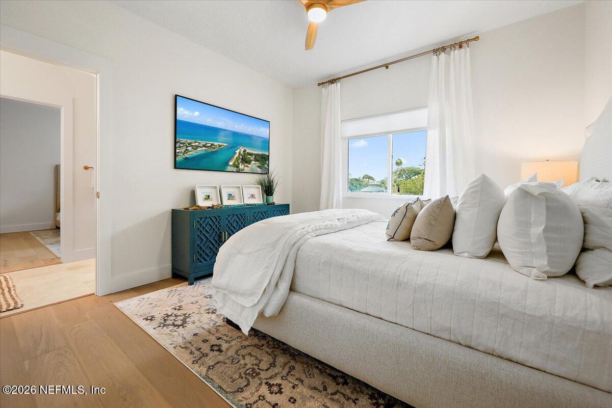 2253 Beachcomber Trail Atlantic Beach, FL 32233 - Photo 30 of 42 a bedroom with a large bed and a window