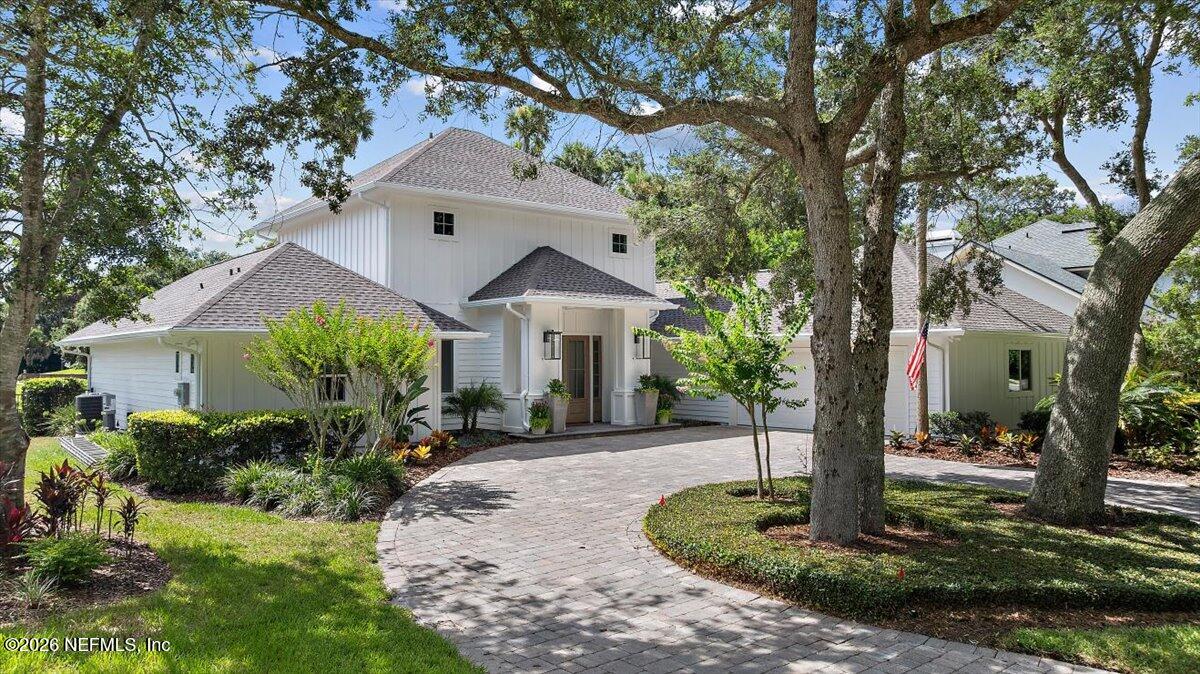 2253 Beachcomber Trail Atlantic Beach, FL 32233 - Photo 3 of 42 a front view of a house with a yard