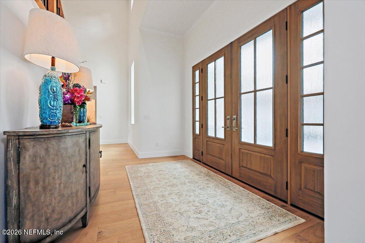 2253 Beachcomber Trail Atlantic Beach, FL 32233 - Photo 5 of 42 a view of entryway with window and wooden floor