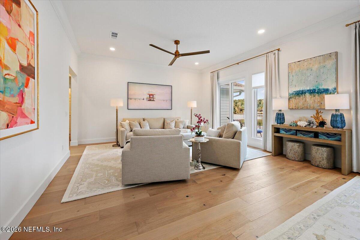2253 Beachcomber Trail Atlantic Beach, FL 32233 - Photo 6 of 42 a living room with furniture and kitchen view