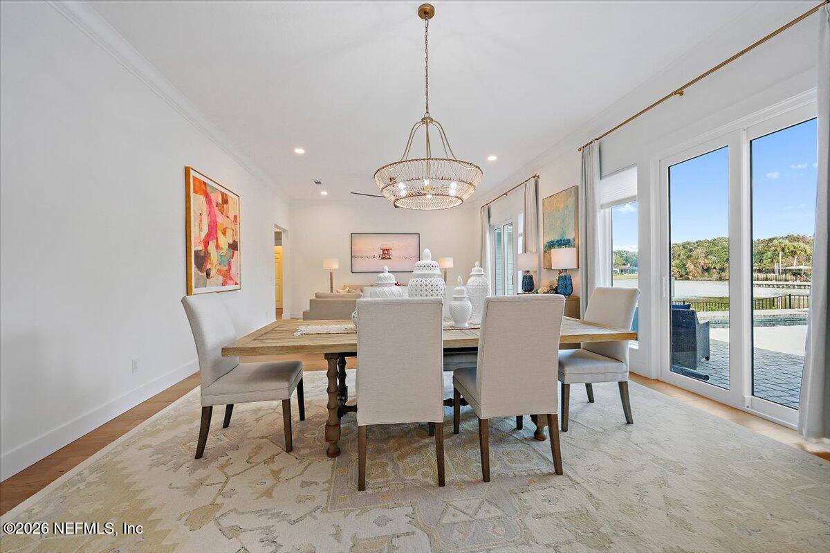 2253 Beachcomber Trail Atlantic Beach, FL 32233 - Photo 7 of 42 a view of a dining room with furniture window and outside view