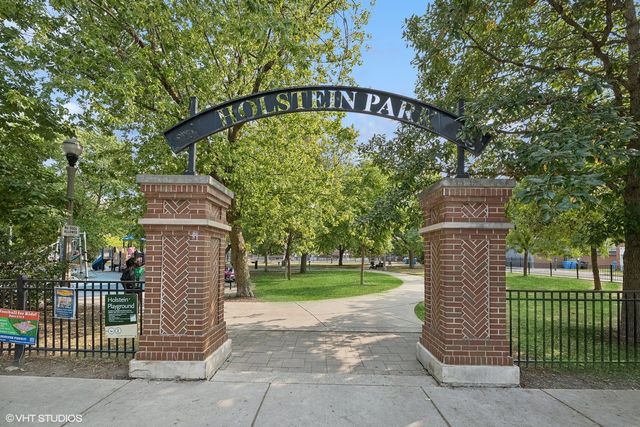 a sign on the side of a road